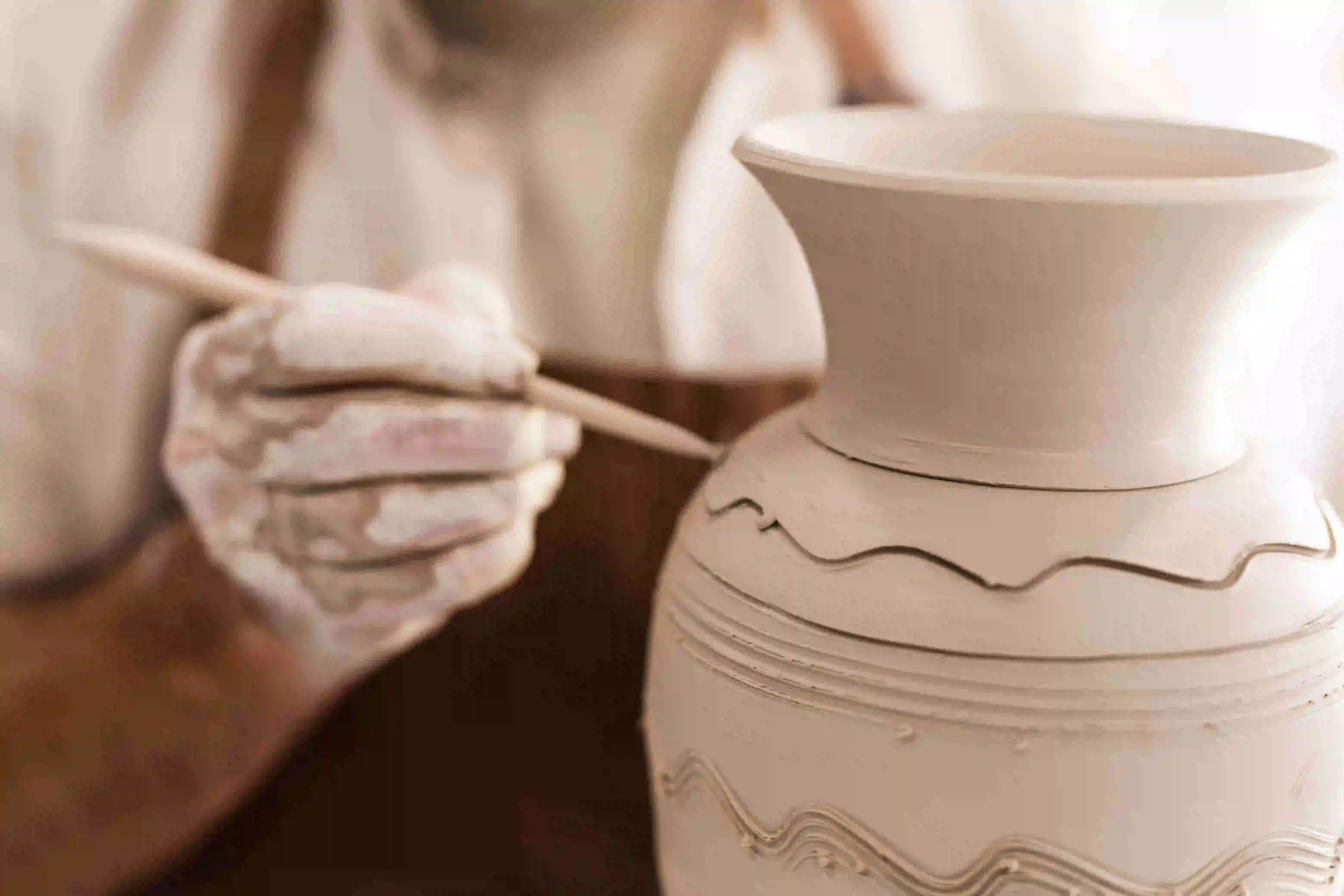 Beautiful handcrafted clay vase with textured surface for flowers and plants