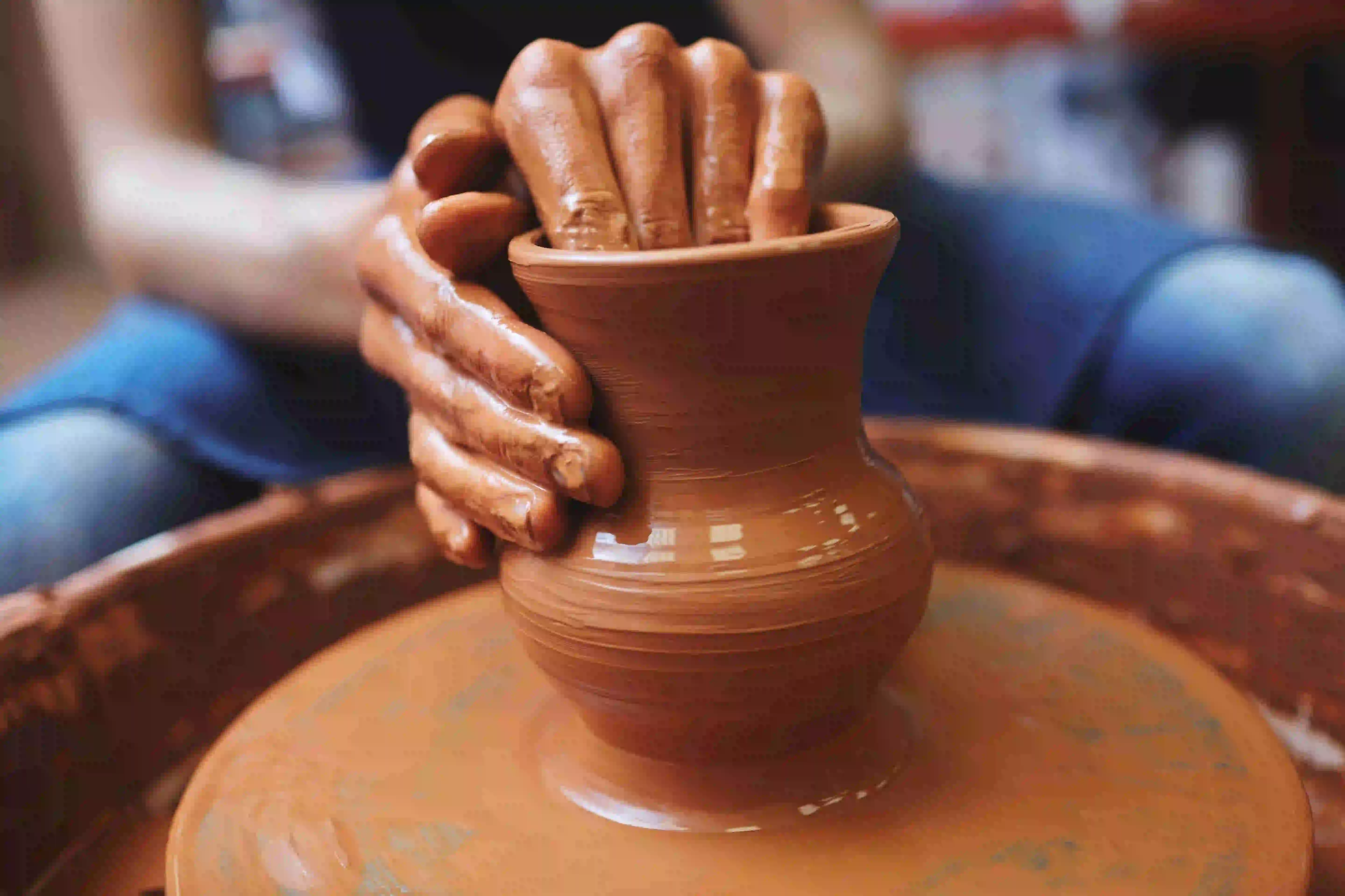 Handmade terracotta clay pot with natural earth finish, perfect for home decor